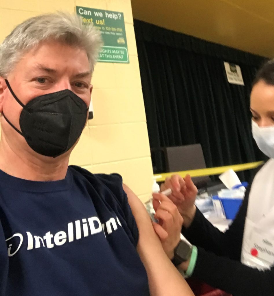 IntelliDyne CEO Robert Grey receives COVID-19 vaccine.